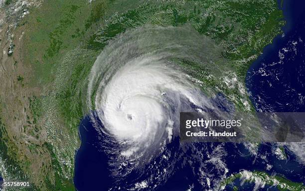 In this satellite image from NOAA taken at 4:15 p.m. EDT, the leading edge of Hurricane Rita is shown reaching the Texas coast September 23, 2005....