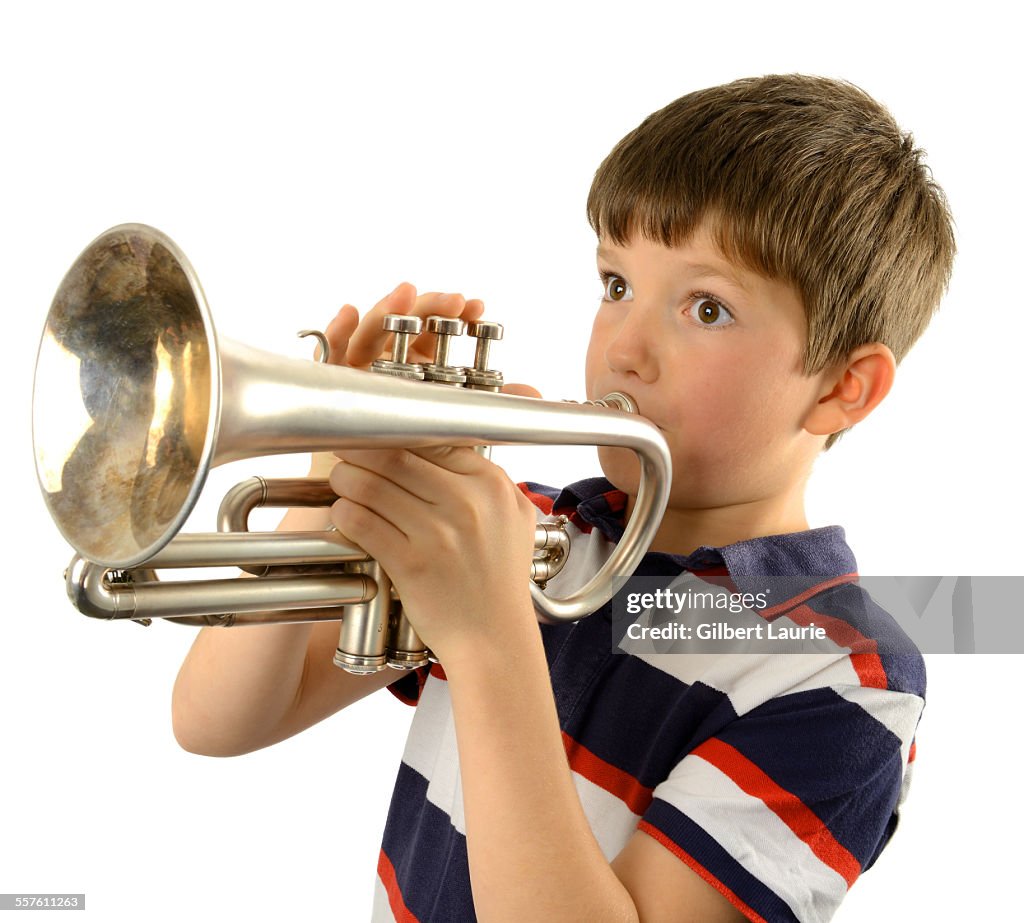 Boy playing a trumpet