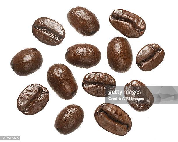 coffee beans on light box - roasted coffee bean stock pictures, royalty-free photos & images