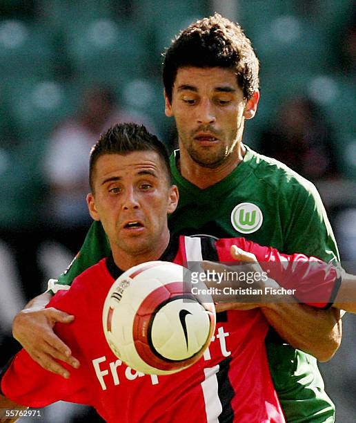 Benjamin Koehler of Frankfurt fights for the ball against Alex of Wolfsburg during the Bundesliga match between VFL Wolfsburg and Eintracht Frankfurt...