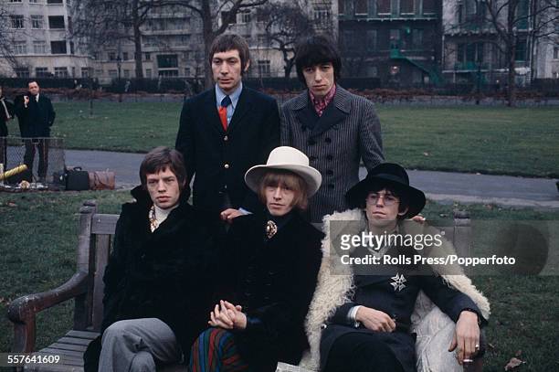 The Rolling Stones pictured together in Green Park, London for a press call on 11th January 1967. Clockwise from top left: Charlie Watts, Bill Wyman,...