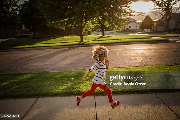 little girl running - street running bildbanksfoton och bilder