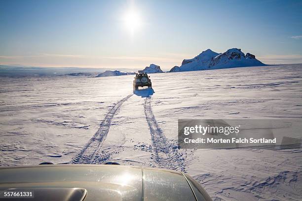 cars in the cold - langjokull stock pictures, royalty-free photos & images