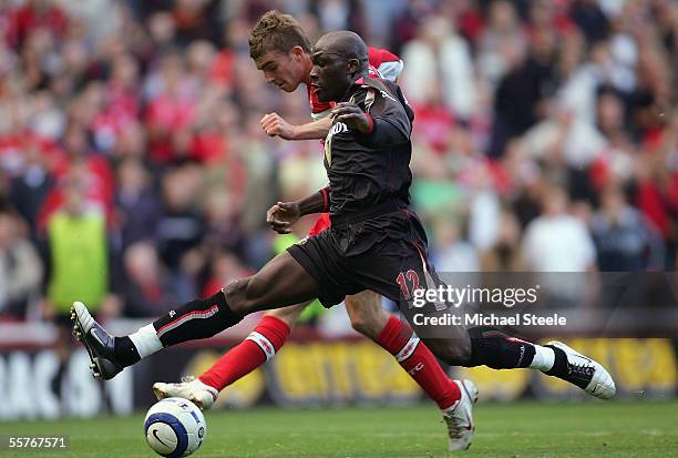 James Morrison of Middlesbrough shoots as Nyron Nosworthy challenges during the Barclays Premiership match between Middlesbrough and Sunderland at...