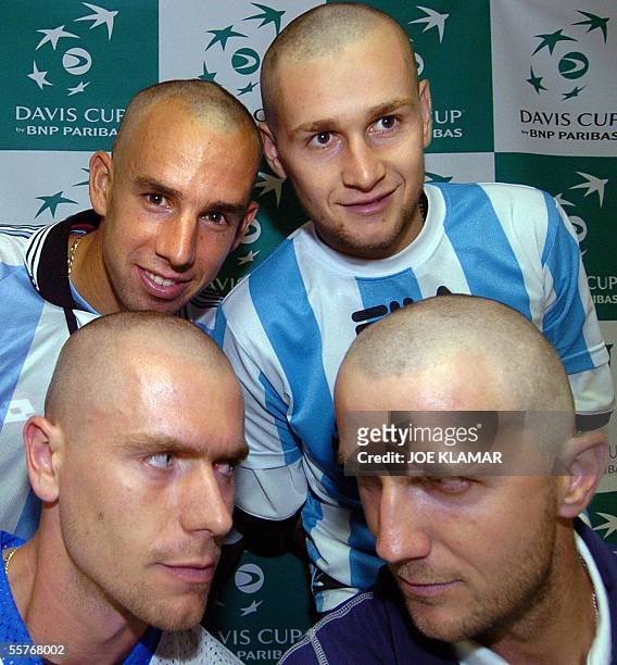 Slovakia's Davis cup players Dominik Hrbaty ,Karol Kucera ,Karol Beck and Michal Mertinak pose with freshly shaved heads during the press conference...