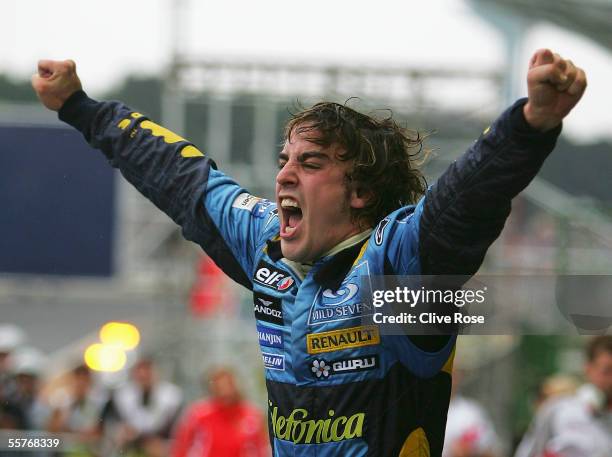 Fernando Alonso of Spain and Renault celebrates winning the World Championship after finishing third in the Brazilian F1 Grand Prix at the Autodromo...