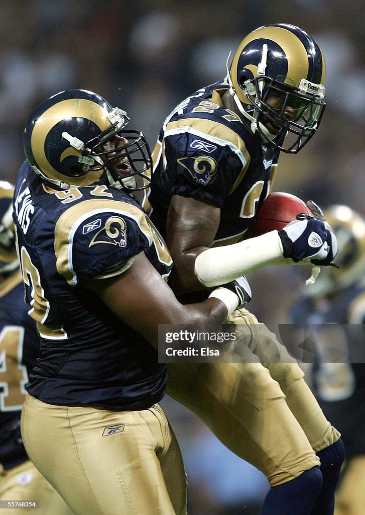Lewis Rams Player Damione Lewis of the St. Louis Rams celebrates with teammate Michael ...