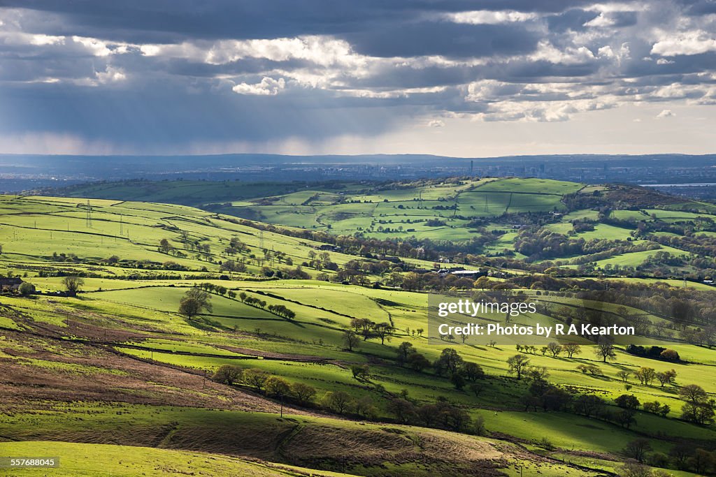 April showers over a green spring landscape