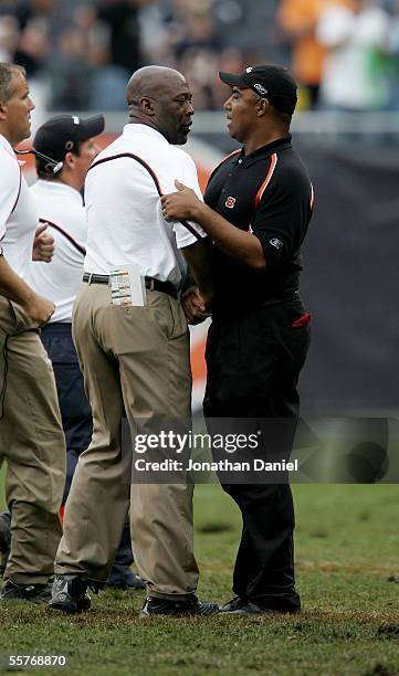 Head Coach Lovie Smith of the Chicago Bears congratulates Head Coach Marvin Lewis of the Cincinnati Bengals after a game on September 25, 2005 at...