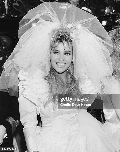 Model Mandy Smith dressed as a bride for a fashion show at Stringfellows night club, London, October 2nd 1986.