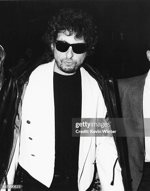 Musician Bob Dylan wearing sunglasses, circa 1985.