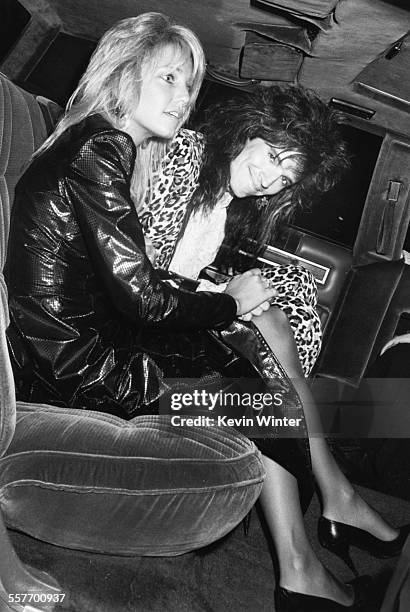 Actress Heather Locklear and her husband, 'Motley Crue' musician Tommy Lee, in the back of a car as they attend the MTV Music Awards, at the...