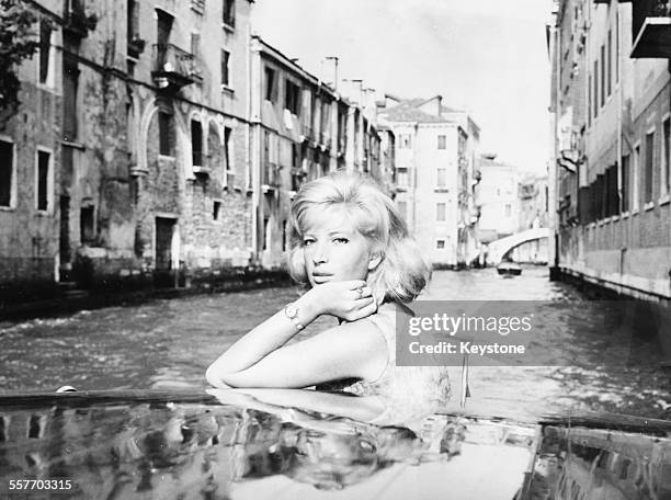 Portrait of actress Monica Vitti on a boat, attending the International Film Festival, Venice, September 11th 1962.