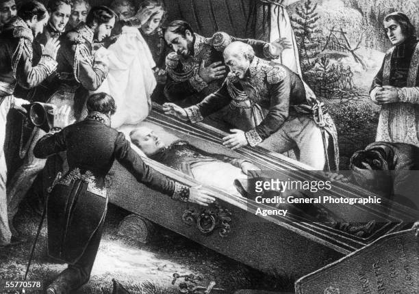 Priest and a group of English officers gather round the coffin of exiled former French Emperor Napoleon Bonaparte after his death on the island of St...