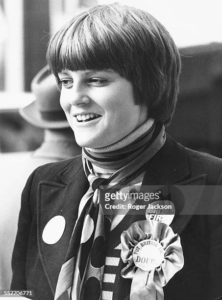 Lady Jane Wellesley wearing rosettes in support of her brother Charles during the election, during a tour of Islington, London, October 8th 1974.