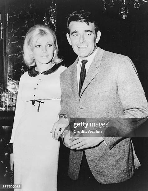 Actors Susan Denberg and Stuart Whitman arriving arm in arm at a cocktail party in Los Angeles, May 4th 1966.