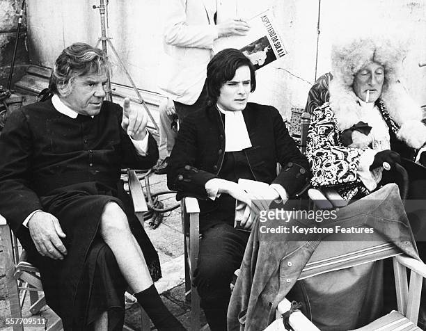 Actors Lionel Stander, Leonard Whiting and Wildrid Brambell taking a break on the set of the film 'Giacomo Casanova: Childhood and Adolescence',...