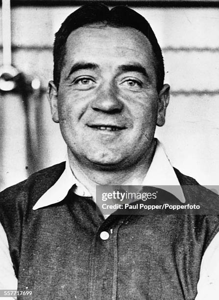 Portrait of Arsenal inside forward football player Alex James posed in 1934.