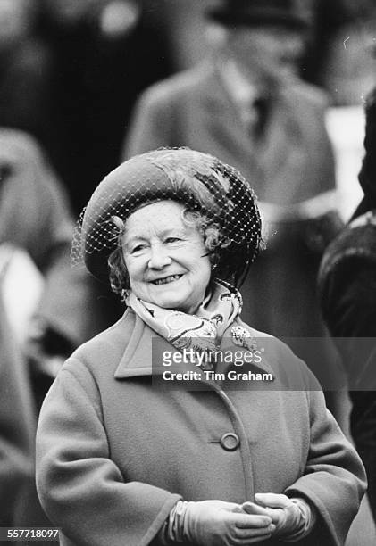 The Queen Mother smiling as she watches the horse racing at Sandown Races, England, March 13th 1987.