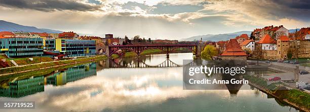 maribor bridge and drava river, slovenia - maribor slovenia stock pictures, royalty-free photos & images