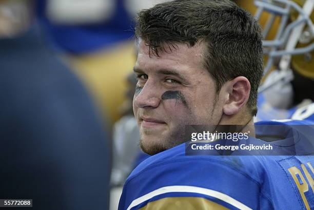 Quarterback Tyler Palko of the University of Pittsburgh Panthers watches the action from the bench during a game against the Youngstown State...