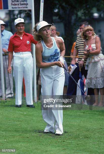 American golfer Laura Baugh watches her ball on the green during play, August 1978.