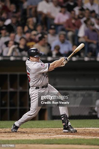 Mike Redmond of the Minnesota Twins bats during the game against the Chicago White Sox at U.S. Cellular Field on August 17, 2005 in Chicago,...