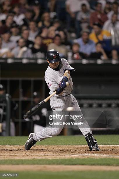Jason Bartlett of the Minnesota Twins bats during the game against the Chicago White Sox at U.S. Cellular Field on August 17, 2005 in Chicago,...