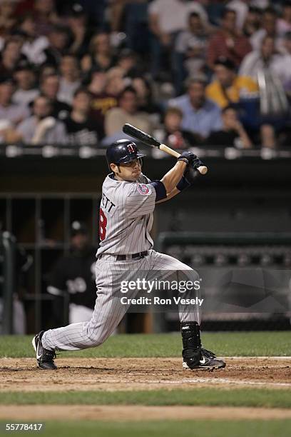 Jason Bartlett of the Minnesota Twins bats during the game against the Chicago White Sox at U.S. Cellular Field on August 17, 2005 in Chicago,...