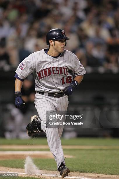 Jason Bartlett of the Minnesota Twins runs during the game against the Chicago White Sox at U.S. Cellular Field on August 17, 2005 in Chicago,...