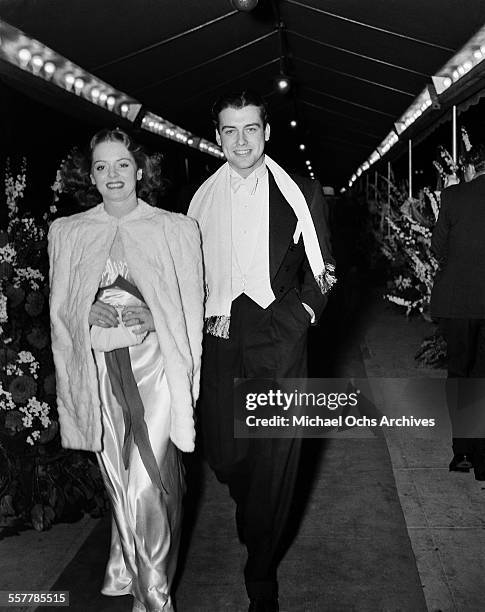 Actor Richard Greene with actress Arleen Whelan arrives to an event in Los Angeles, California.