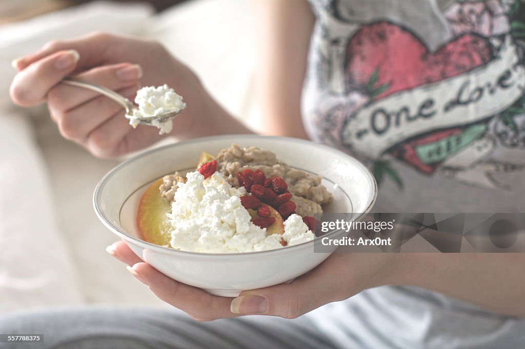 Girl eating breakfast