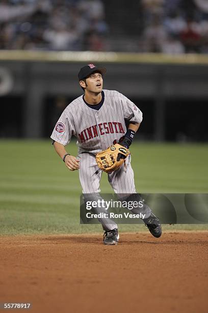 Jason Bartlett of the Minnesota Twins fields during the game against the Chicago White Sox at U.S. Cellular Field on August 17, 2005 in Chicago,...