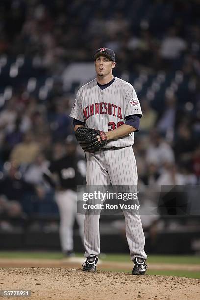 Joe Nathan of the Minnesota Twins pitches during the game against the Chicago White Sox at U.S. Cellular Field on August 17, 2005 in Chicago,...