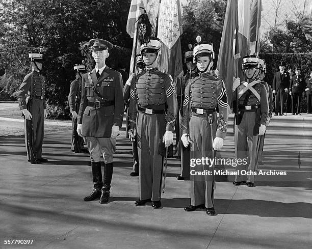Actor Jackie Cooper and Freddie Bartholomew stand at attention on set of the movie "Spirit of Culver"