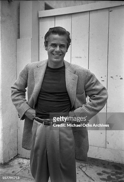 Actor Glenn Ford smiles as he poses in Los Angeles, California.