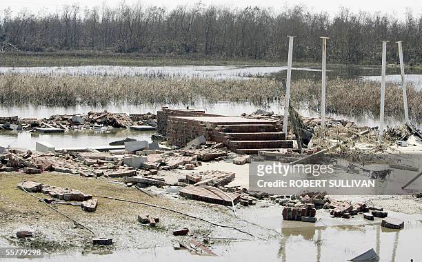 The foundation is all that remains of a house washed away on highway 27 in the southwestern costal town of Creole, Louisiana 26 September, 2005....