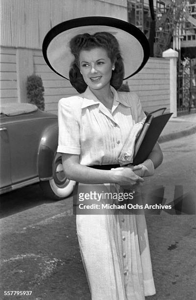 Actress Barbara Hale stops and poses on a street in Los Angeles, California.