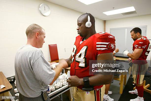 Marques Douglas of the San Francisco 49ers is taped in the locker room before the NFL game against the Philadelphia Eagles at Lincoln Financial Field...