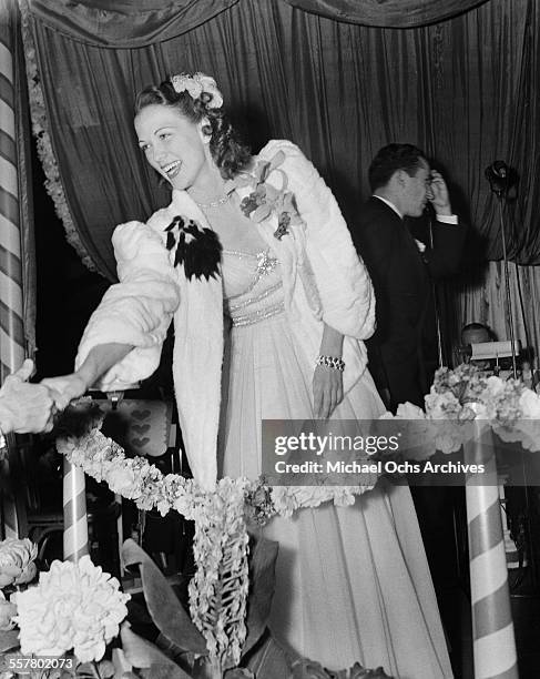 Actress Eleanor Powell greets fans during an event in Los Angeles, California.