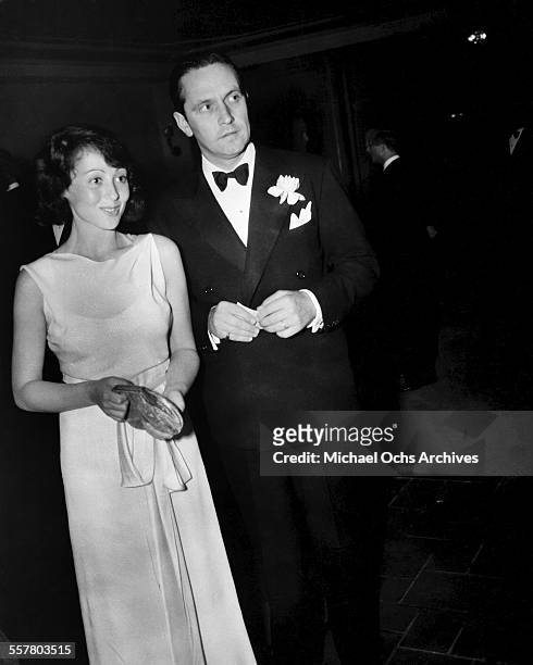 Actress Luise Rainer with actor Fredric March attend an event in Los Angeles, California.