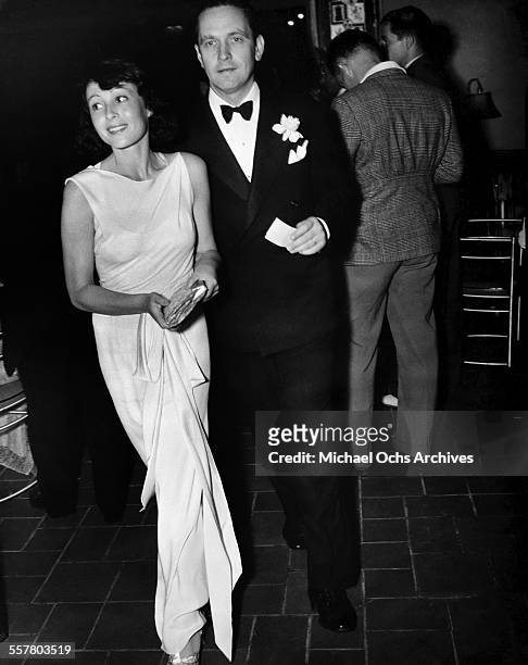 Actress Luise Rainer with actor Fredric March attend an event in Los Angeles, California.