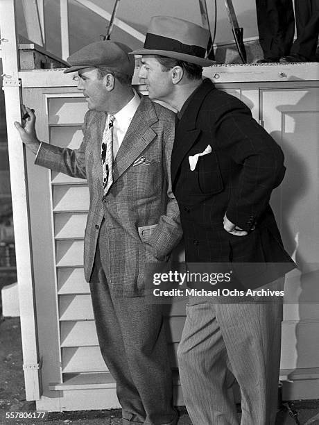 Actors William Powell and Pat O'Brien on set in Los Angeles, California.