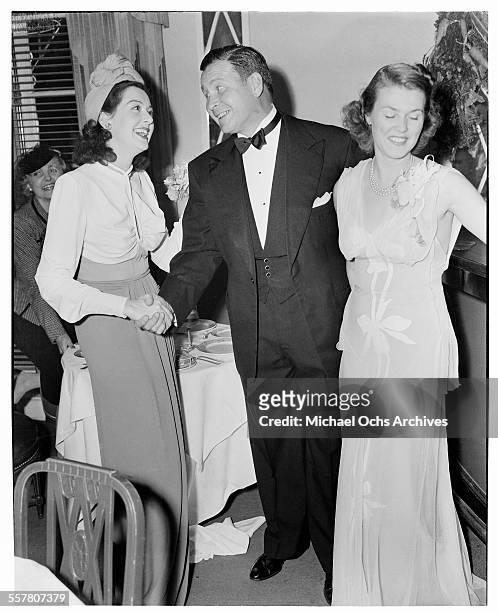 Actress Rosalind Russell congratulates a friends wedding in Los Angeles, California.