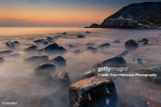 smoky sea shore - fujairah bildbanksfoton och bilder