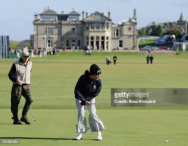 Film Star Michael Douglas and his wife Catherine Zeta-Jones putt on the first green during a practice round prior to the Dunhill Links Championships...