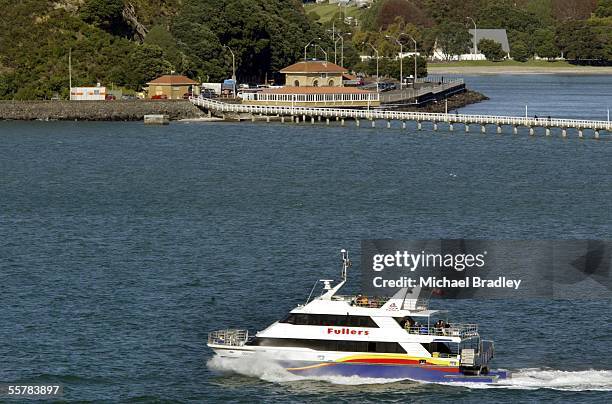 Fuller ferry passes by Kelly Taltons and Orakei Wharf as seen from North head on the North Shore, Auckland New Zealand, Wednesday, May 26 2004.