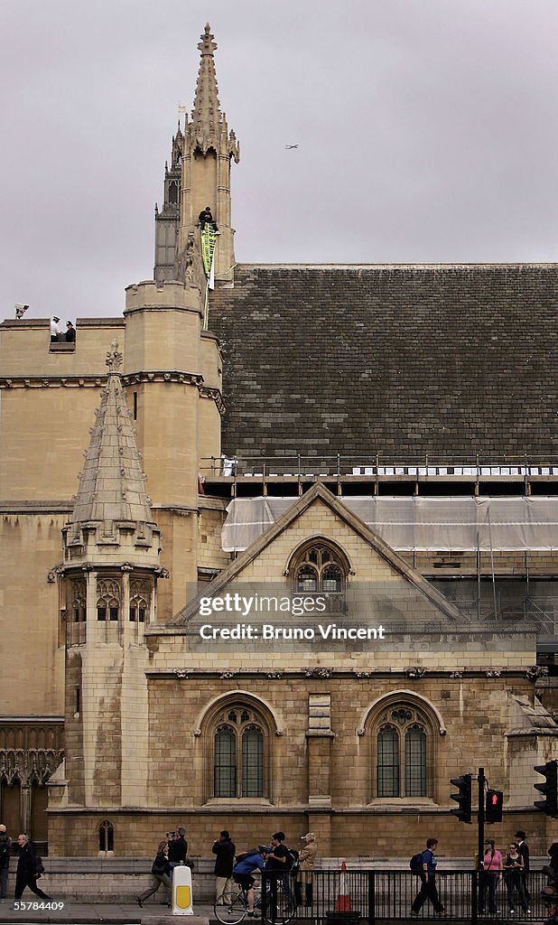 Protestor Scales The Houses Of Parliament