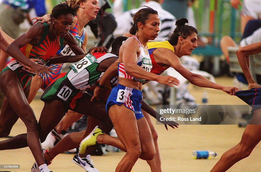 Kelly Holmes of Great Britain keeps her feet as al