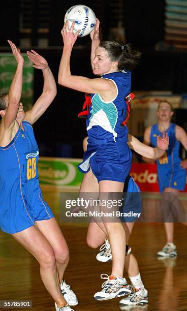 Auckland Waitakere's Leigh Price looks to pass over Otago's Lesley Nicol during the netball match between Auckland Waitakere and Otago at the...